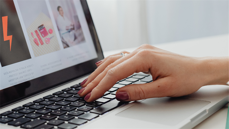 Hand typing on a computer keyboard