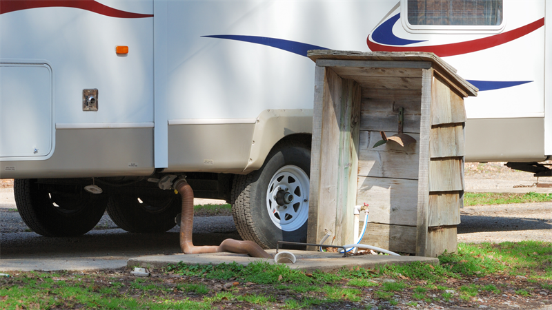 RV hooked up to dump station