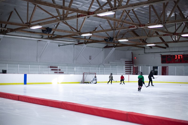 People playing ice hockey